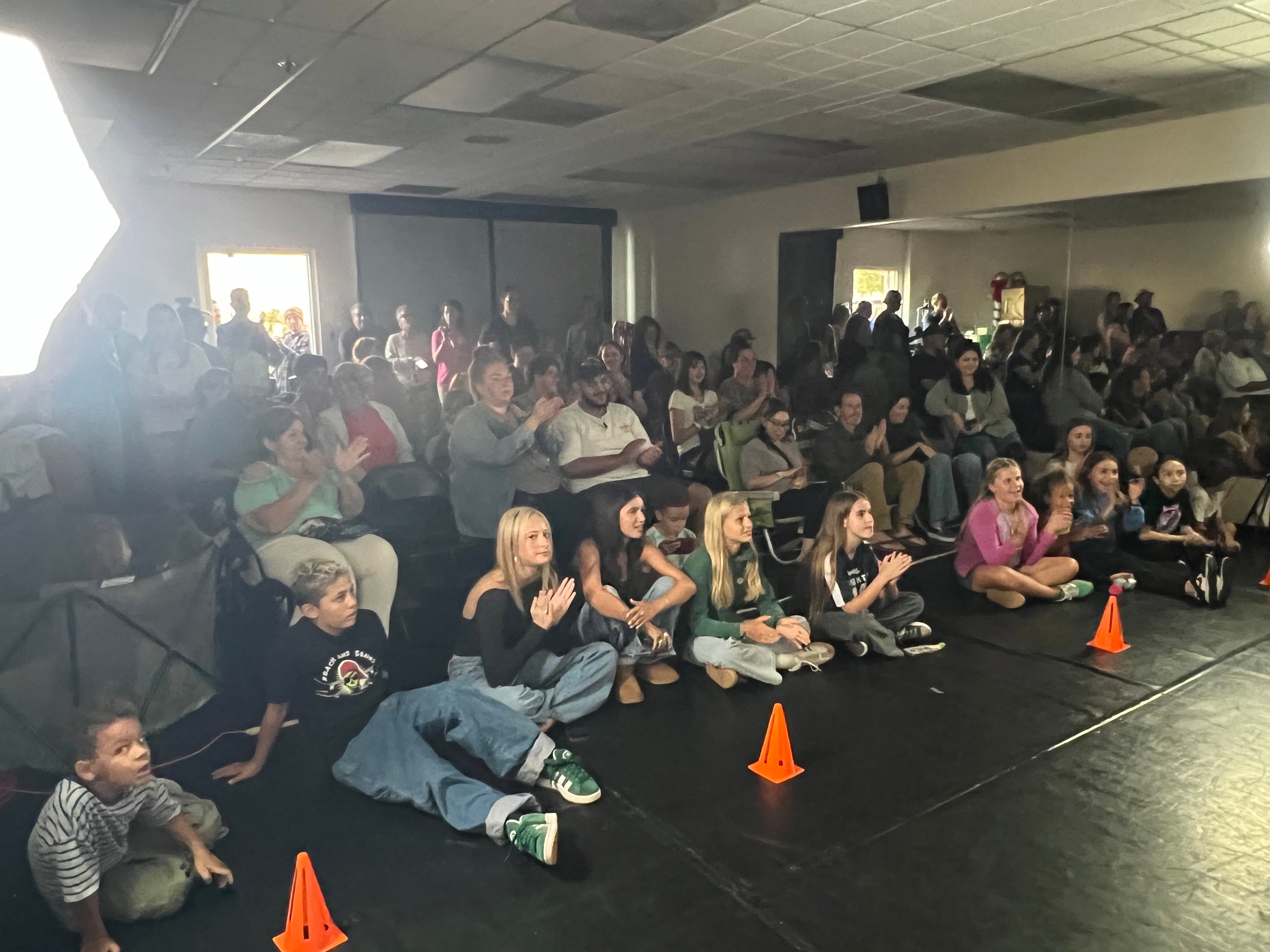Packed audience watching KPAC musical theater performance